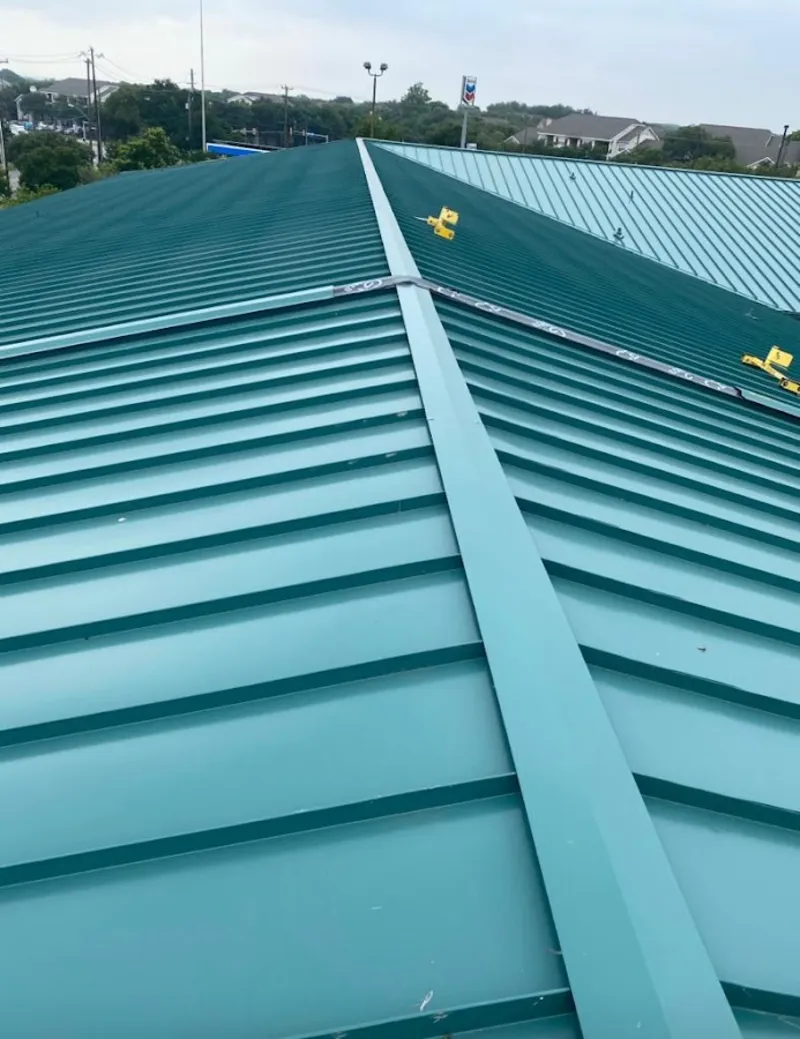 Green commercial metal roof ridge and valley for Metal Roof Repair in Kearney