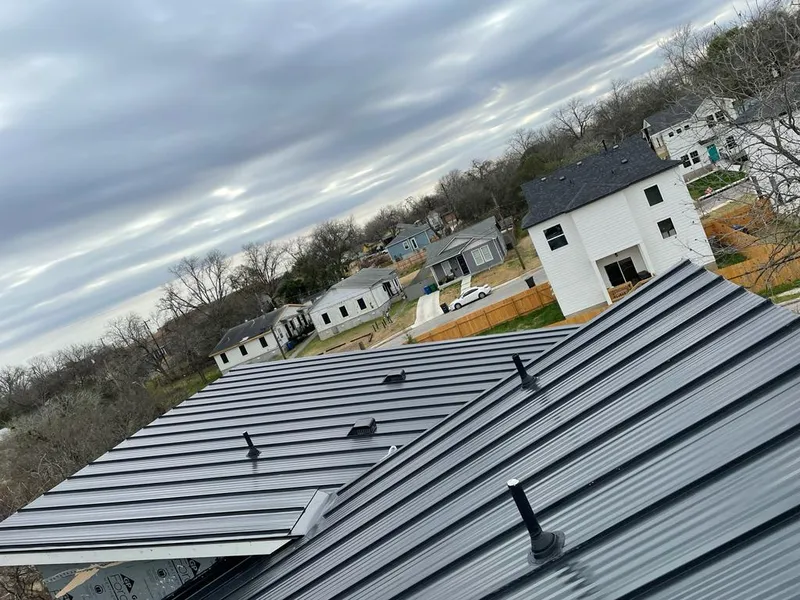 Standing seam metal roof panels with vents for Skylight Repair in Kearney
